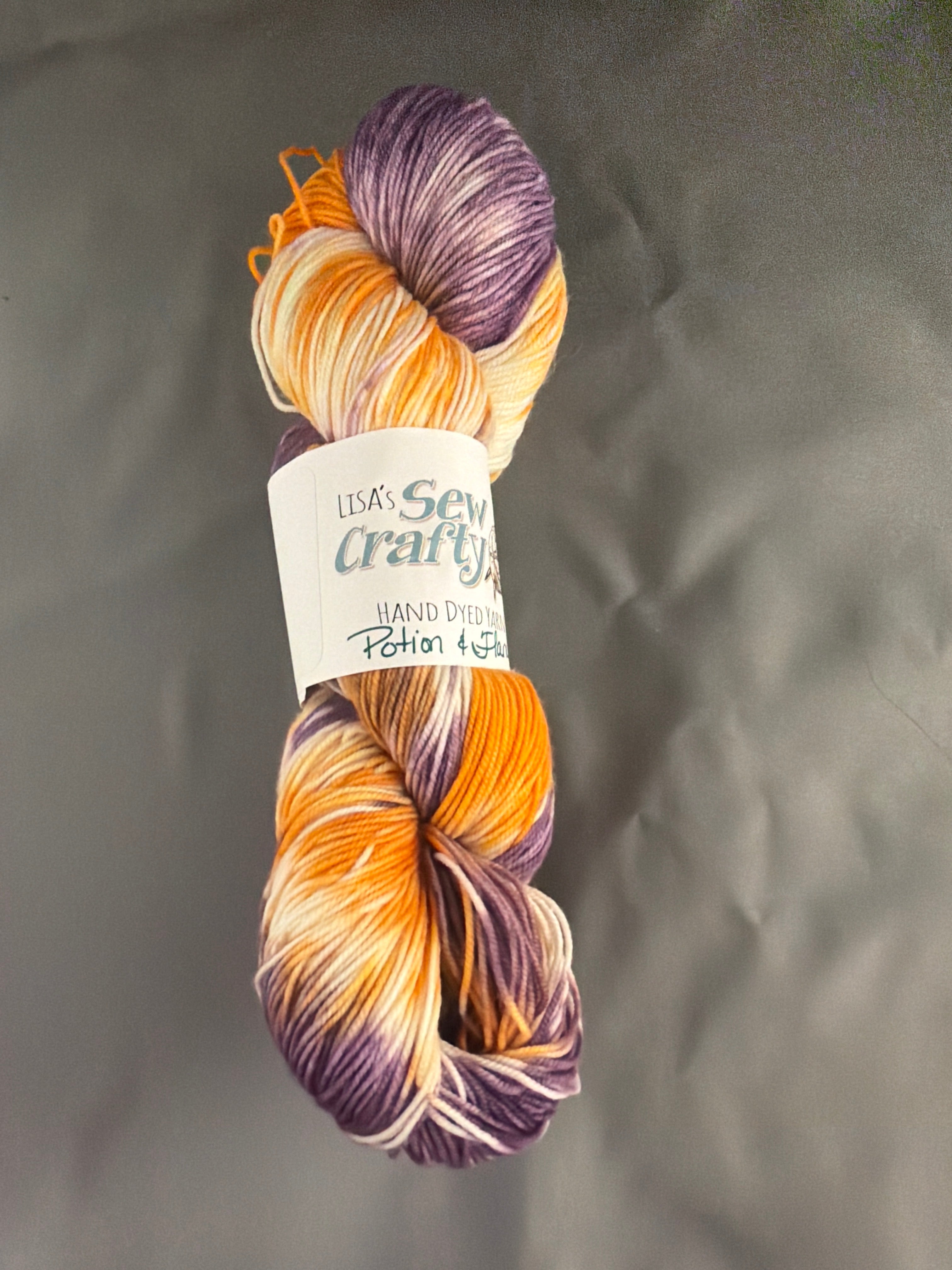 Potion and flame- hand dyed yarn