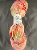 Electric speckle. UV reactive hand dyed yarn